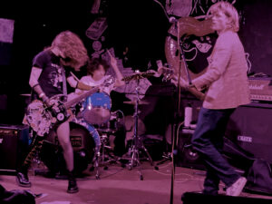 Punk band Mugslug on stage at 924 Gilman