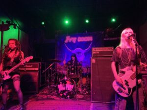 Rock trio Fatale on stage at the Ivy Room